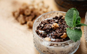 Mint-Chocolate Chip granola with milk & fresh mint. Oats, hazelnuts, sunflower and pumpkin seeds, organic virgin coconut oil, maple syrup, raw cacao, raw cacao nibs, peppermint. Refined sugar free, no inflammatory fats, vegan, dairy free, no sulpates